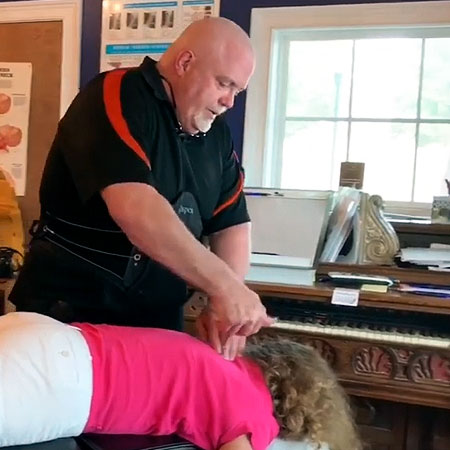 Doctor Stover provides chiropractic care to patient